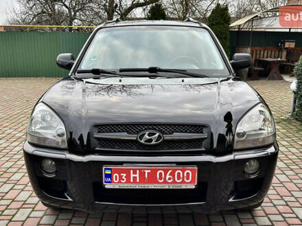Чорний Хендай Туксон, об'ємом двигуна 2 л та пробігом 182 тис. км за 8299 $, фото 1 на Automoto.ua