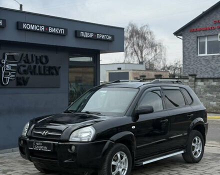 Черный Хендай Туксон, объемом двигателя 2 л и пробегом 240 тыс. км за 6888 $, фото 1 на Automoto.ua