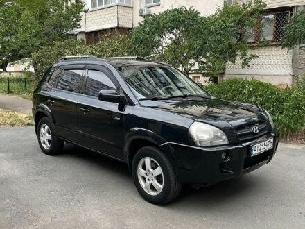 Чорний Хендай Туксон, об'ємом двигуна 1.98 л та пробігом 268 тис. км за 7900 $, фото 1 на Automoto.ua