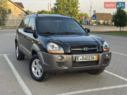 Черный Хендай Туксон, объемом двигателя 2 л и пробегом 250 тыс. км за 7150 $, фото 1 на Automoto.ua