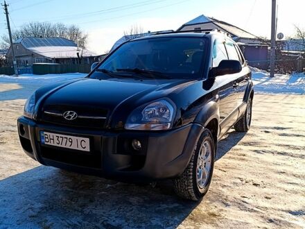 Черный Хендай Туксон, объемом двигателя 2.7 л и пробегом 21100 тыс. км за 8500 $, фото 1 на Automoto.ua
