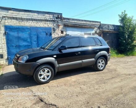 Чорний Хендай Туксон, об'ємом двигуна 2 л та пробігом 190 тис. км за 7900 $, фото 1 на Automoto.ua