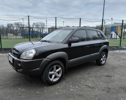 Черный Хендай Туксон, объемом двигателя 2 л и пробегом 292 тыс. км за 6200 $, фото 1 на Automoto.ua