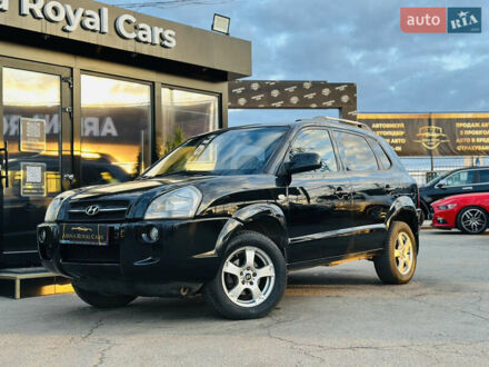 Черный Хендай Туксон, объемом двигателя 2 л и пробегом 186 тыс. км за 8300 $, фото 1 на Automoto.ua