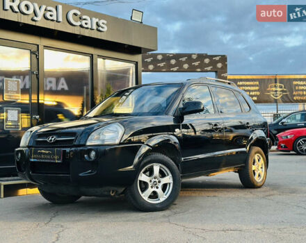 Черный Хендай Туксон, объемом двигателя 2 л и пробегом 186 тыс. км за 8300 $, фото 1 на Automoto.ua