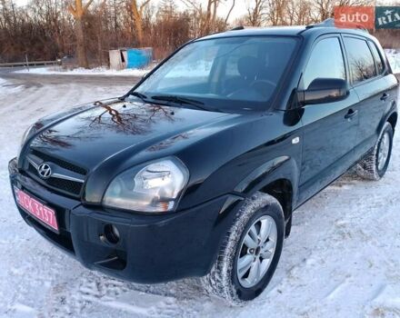 Черный Хендай Туксон, объемом двигателя 2 л и пробегом 205 тыс. км за 8000 $, фото 1 на Automoto.ua