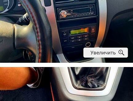 Черный Хендай Туксон, объемом двигателя 2 л и пробегом 175 тыс. км за 8500 $, фото 1 на Automoto.ua