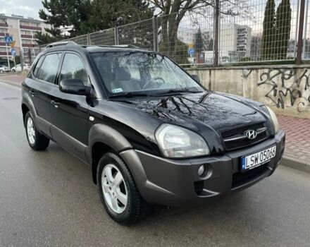 Черный Хендай Туксон, объемом двигателя 2 л и пробегом 235 тыс. км за 3000 $, фото 1 на Automoto.ua