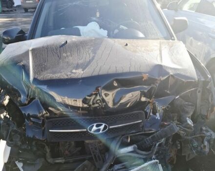 Черный Хендай Туксон, объемом двигателя 2 л и пробегом 279 тыс. км за 4000 $, фото 1 на Automoto.ua