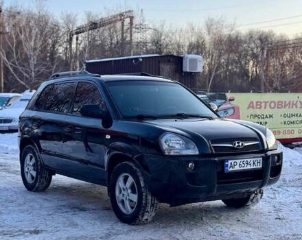 Черный Хендай Туксон, объемом двигателя 1.98 л и пробегом 160 тыс. км за 7999 $, фото 1 на Automoto.ua