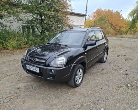 Черный Хендай Туксон, объемом двигателя 2 л и пробегом 235 тыс. км за 7193 $, фото 1 на Automoto.ua