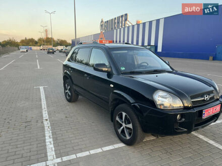 Чорний Хендай Туксон, об'ємом двигуна 2 л та пробігом 181 тис. км за 7600 $, фото 1 на Automoto.ua
