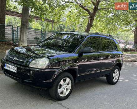 Черный Хендай Туксон, объемом двигателя 2 л и пробегом 190 тыс. км за 7850 $, фото 1 на Automoto.ua