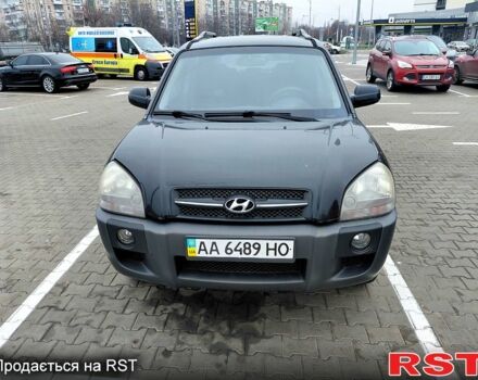 Чорний Хендай Туксон, об'ємом двигуна 2 л та пробігом 106 тис. км за 8350 $, фото 1 на Automoto.ua