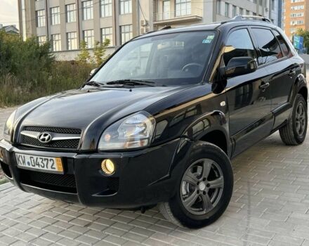Черный Хендай Туксон, объемом двигателя 2 л и пробегом 168 тыс. км за 8300 $, фото 1 на Automoto.ua