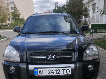 Черный Хендай Туксон, объемом двигателя 1.98 л и пробегом 256 тыс. км за 8200 $, фото 1 на Automoto.ua