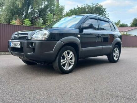 Черный Хендай Туксон, объемом двигателя 2 л и пробегом 168 тыс. км за 9000 $, фото 1 на Automoto.ua