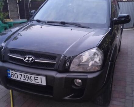 Черный Хендай Туксон, объемом двигателя 1.98 л и пробегом 209 тыс. км за 8200 $, фото 1 на Automoto.ua
