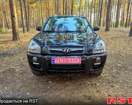 Чорний Хендай Туксон, об'ємом двигуна 2 л та пробігом 204 тис. км за 8900 $, фото 1 на Automoto.ua