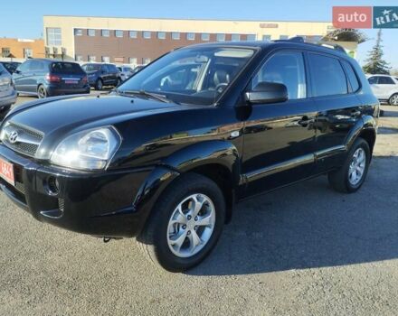 Черный Хендай Туксон, объемом двигателя 1.99 л и пробегом 159 тыс. км за 9700 $, фото 1 на Automoto.ua