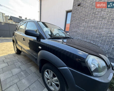 Чорний Хендай Туксон, об'ємом двигуна 1.98 л та пробігом 200 тис. км за 8200 $, фото 1 на Automoto.ua