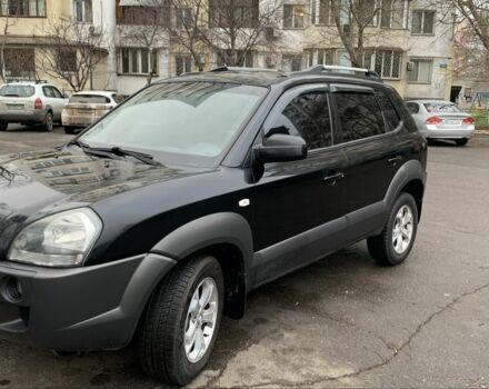 Черный Хендай Туксон, объемом двигателя 2 л и пробегом 180 тыс. км за 7999 $, фото 1 на Automoto.ua