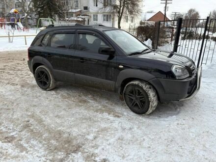 Чорний Хендай Туксон, об'ємом двигуна 2 л та пробігом 230 тис. км за 6600 $, фото 1 на Automoto.ua