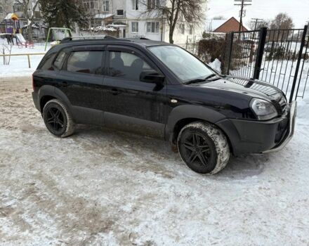 Черный Хендай Туксон, объемом двигателя 2 л и пробегом 230 тыс. км за 6600 $, фото 1 на Automoto.ua