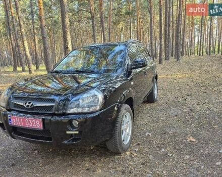 Черный Хендай Туксон, объемом двигателя 2 л и пробегом 201 тыс. км за 8999 $, фото 1 на Automoto.ua