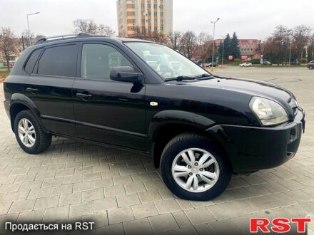 Черный Хендай Туксон, объемом двигателя 2 л и пробегом 168 тыс. км за 7700 $, фото 1 на Automoto.ua