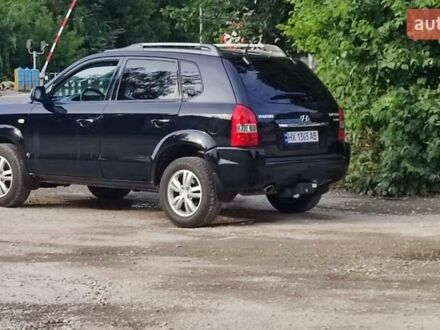 Чорний Хендай Туксон, об'ємом двигуна 2 л та пробігом 157 тис. км за 10000 $, фото 1 на Automoto.ua