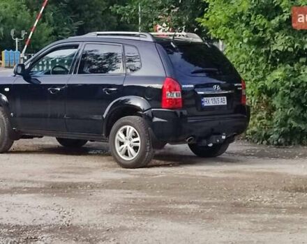Чорний Хендай Туксон, об'ємом двигуна 2 л та пробігом 157 тис. км за 10000 $, фото 1 на Automoto.ua