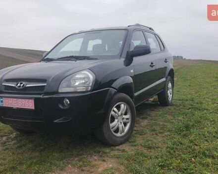 Черный Хендай Туксон, объемом двигателя 2 л и пробегом 198 тыс. км за 8200 $, фото 1 на Automoto.ua