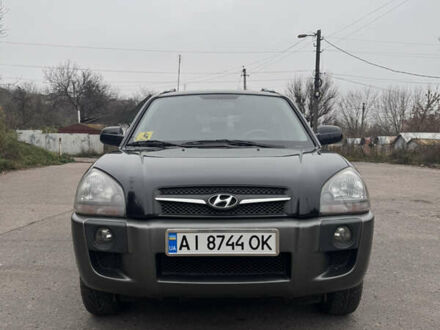 Черный Хендай Туксон, объемом двигателя 1.98 л и пробегом 120 тыс. км за 8500 $, фото 1 на Automoto.ua