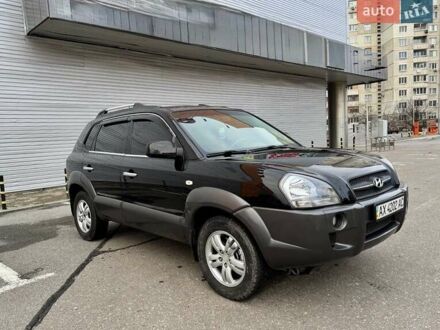 Черный Хендай Туксон, объемом двигателя 2 л и пробегом 282 тыс. км за 8700 $, фото 1 на Automoto.ua