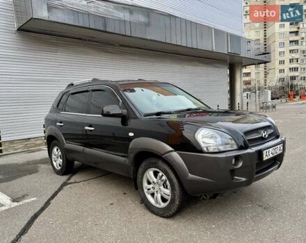 Черный Хендай Туксон, объемом двигателя 2 л и пробегом 282 тыс. км за 8700 $, фото 1 на Automoto.ua
