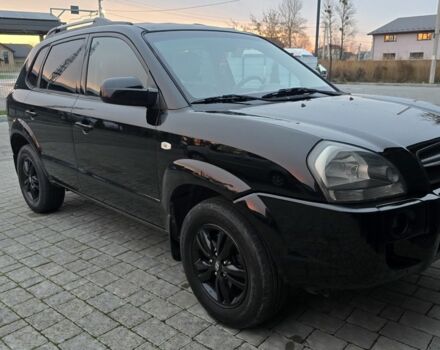 Черный Хендай Туксон, объемом двигателя 2 л и пробегом 198 тыс. км за 7999 $, фото 1 на Automoto.ua