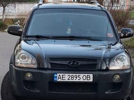 Черный Хендай Туксон, объемом двигателя 1.99 л и пробегом 240 тыс. км за 8700 $, фото 1 на Automoto.ua