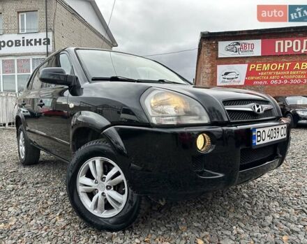 Черный Хендай Туксон, объемом двигателя 2 л и пробегом 166 тыс. км за 7500 $, фото 1 на Automoto.ua