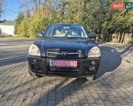 Черный Хендай Туксон, объемом двигателя 2 л и пробегом 187 тыс. км за 7900 $, фото 1 на Automoto.ua