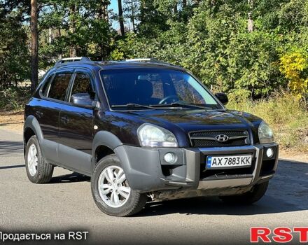 Черный Хендай Туксон, объемом двигателя 2 л и пробегом 180 тыс. км за 8800 $, фото 1 на Automoto.ua