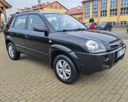 Черный Хендай Туксон, объемом двигателя 1.98 л и пробегом 148 тыс. км за 6199 $, фото 1 на Automoto.ua