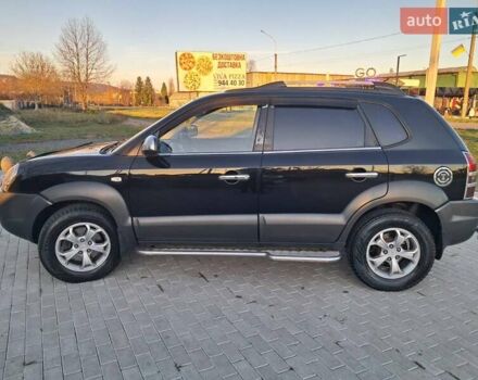 Черный Хендай Туксон, объемом двигателя 1.98 л и пробегом 233 тыс. км за 7850 $, фото 1 на Automoto.ua
