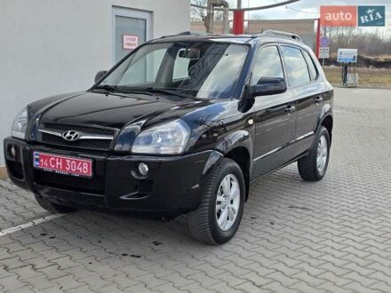 Чорний Хендай Туксон, об'ємом двигуна 2 л та пробігом 193 тис. км за 9450 $, фото 1 на Automoto.ua