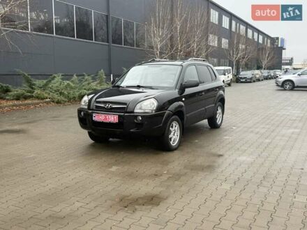 Черный Хендай Туксон, объемом двигателя 2 л и пробегом 237 тыс. км за 8350 $, фото 1 на Automoto.ua