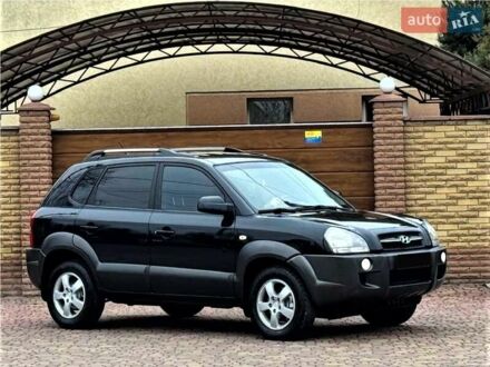 Черный Хендай Туксон, объемом двигателя 2 л и пробегом 91 тыс. км за 10900 $, фото 1 на Automoto.ua