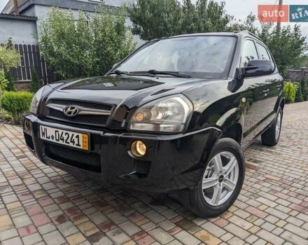Чорний Хендай Туксон, об'ємом двигуна 2 л та пробігом 217 тис. км за 7700 $, фото 1 на Automoto.ua