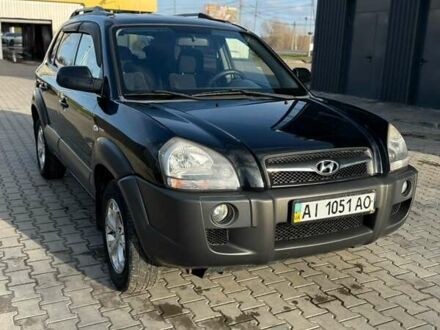 Черный Хендай Туксон, объемом двигателя 1.98 л и пробегом 220 тыс. км за 7500 $, фото 1 на Automoto.ua