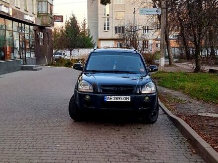 Черный Хендай Туксон, объемом двигателя 2 л и пробегом 240 тыс. км за 8700 $, фото 1 на Automoto.ua