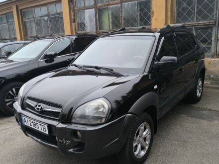 Черный Хендай Туксон, объемом двигателя 2 л и пробегом 237 тыс. км за 7500 $, фото 1 на Automoto.ua